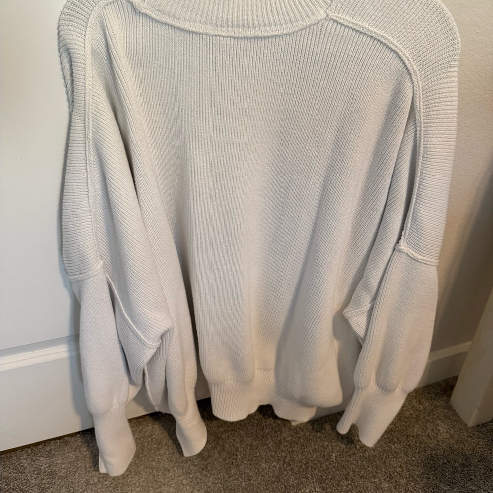 White Free people sweater